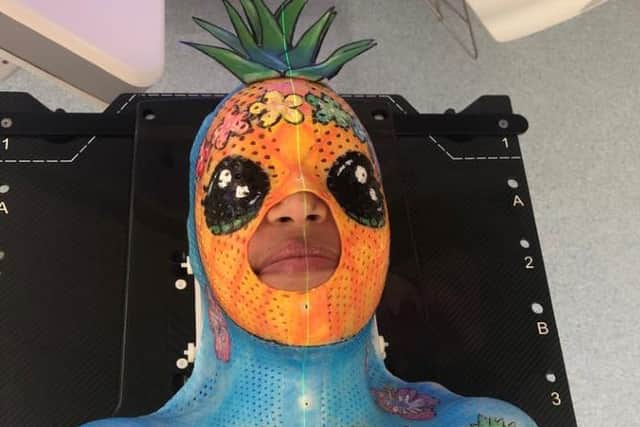 Tegan Clarke, through treatment for Non-Hodgkins lympoma, was determined not to let cancer drag her down, and little things like decorating the mask she wore for radiotherapy helped.