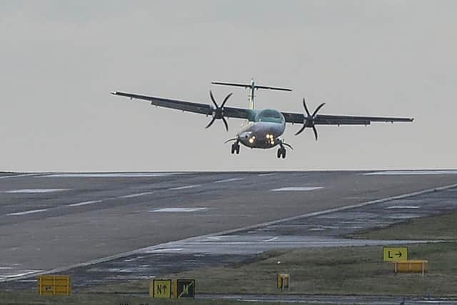 An Aer Lingus flight from Dublin struggles to land at Leeds Bradford Airport in March 2019 amid strong winds brought in by Storm Freya (Photo: Dan Rowlands / SWNS.com).