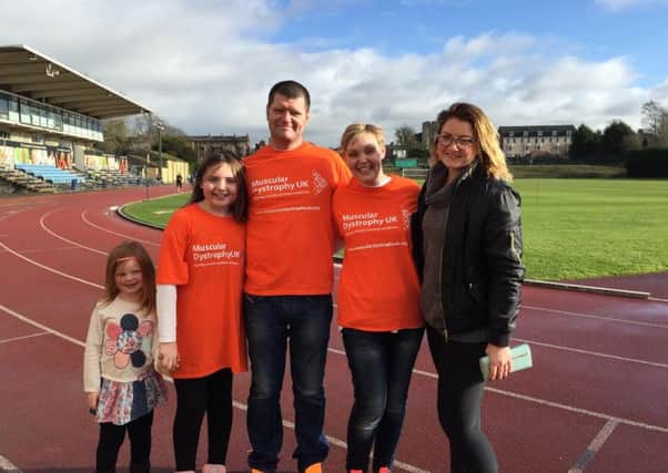 Martin Hywood and family at the Oxford track where Roger Bannister broke the four-minute mile.