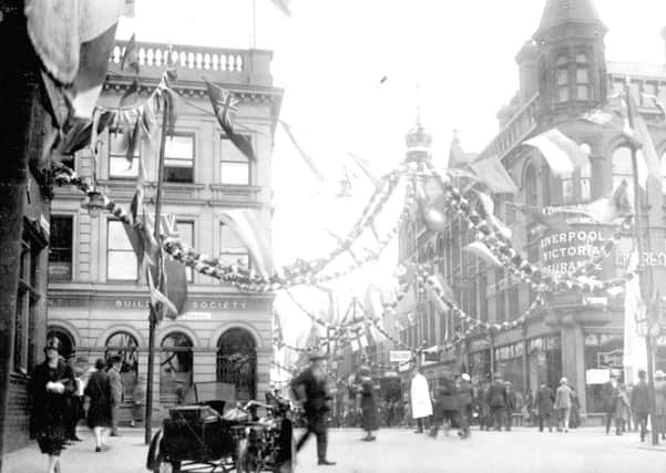 1926: Guildford Street (Headrow) and the junction with Albion Street, which is to the left and right. Decorations are on display for Leeds Tercentenary.