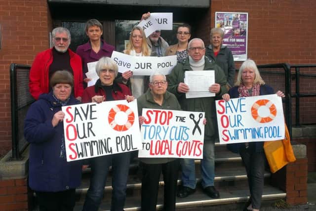 Protesters gather at Castleford swimming pool.