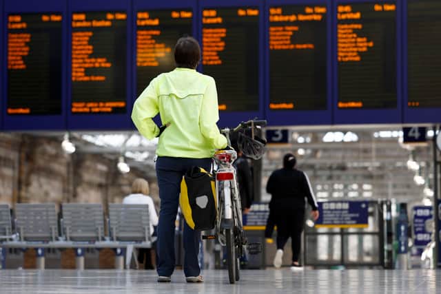 Passengers make their way through Glasgow Central station as a nationwide strike called by the RMT Union was held today on 27 July (Pic: Getty Images)