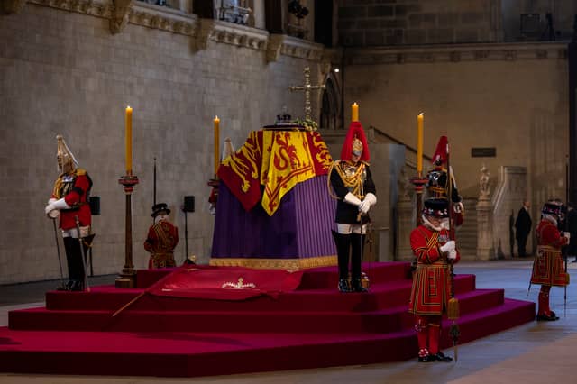 The Queen lying in state in Westminster Hall.