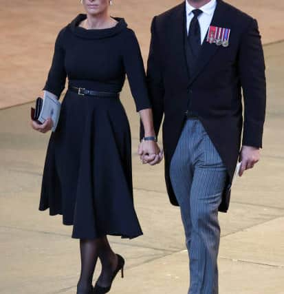 Mike and Zara seen holding hands (Pic:Getty)