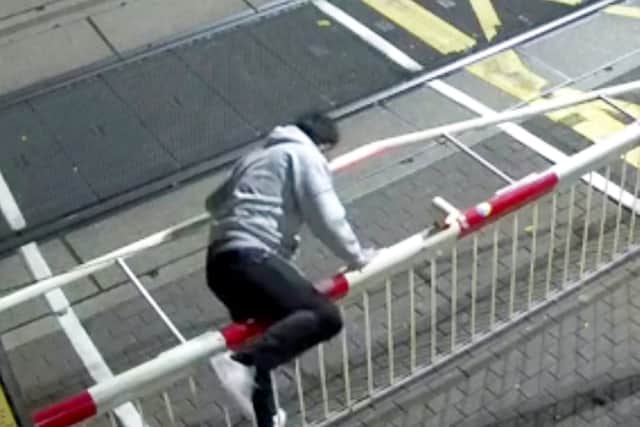 Lincolns latest cohort of students have been taught a lesson in rail safety, after worrying CCTV footage shows a man stumble across a level crossing.