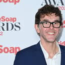 Mark Charnock holds awards for Best Romance, Best Actor and Best Storyline (Getty Images) 