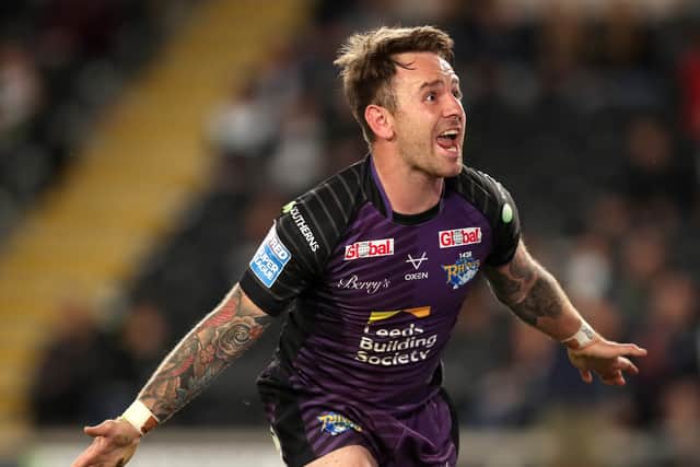 Richie Myler of Leeds Rhinos celebrates after scoring their sides second try during the Betfred Super League match between Hull FC and Leeds Rhinos at KCOM Stadium on July 29, 2021 