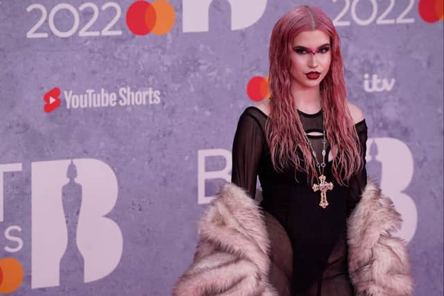 British TikTok influencer Abby Roberts poses on the red carpet upon her arrival for the BRIT Awards 2022 in London on February 8, 2022.  (Photo by NIKLAS HALLE'N/AFP via Getty Images)