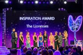 The Lionesses accepting their Inspiration Award from former boxer Nicola Adams, retired athlete Dame Kelly Holmes and cyclist Dame Laura Kenny, at the Pride of Britain Awards 2022. (Credit @PrideOfBritain Twitter)