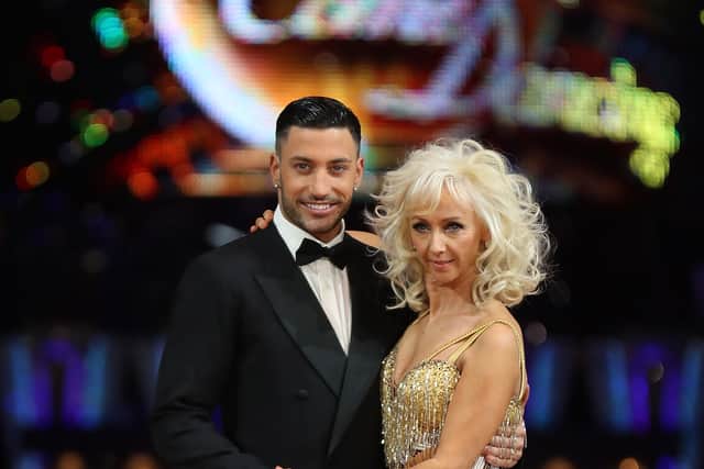 Debbie McGee (R) and Giovanni Pernice attend the 'Strictly Come Dancing' Live! photocall at Arena Birmingham, on January 18, 2018 in Birmingham, England. Ahead of the opening on 19th January 2018. The live show will be touring the United Kingdom until 11th February 2018.  (Photo by Christopher Furlong/Getty Images)
