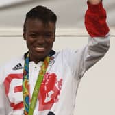 (FILES) In this file photo taken on October 17, 2016 Great Britain's Olympic boxer Nicola Adams is applauded by the general public on a stage in front of Manchester Town Hall after taking part in a "Heroes' Parade" through the streets of Manchester in north west England in acknowledgement of their achievements at the Rio 2016 Olympic and Paralymic Games in Brazil earlier this summer. - One of the most popular programmes on British television, "Strictly Come Dancing", is to feature the first same-sex pairing in its 16-year-history, the BBC said Wednesday.