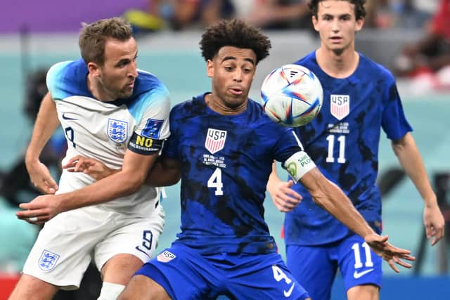 US captain Tyler Adams in action against England. 