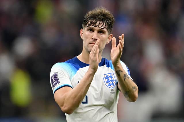 John Stones of England applauds fans after the 0-0 draw during the FIFA World Cup Qatar 2022 Group B match between England and USA at Al Bayt Stadium on November 25, 2022 in Al Khor, Qatar. (Photo by Clive Mason/Getty Images)