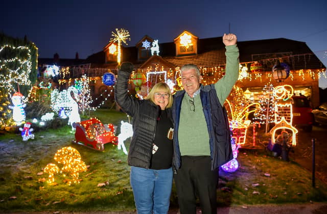 Malcolm Molloy, 64, and his wife Wendy, 62, from Worcestershire wow their neighbours with Christmas lights every year