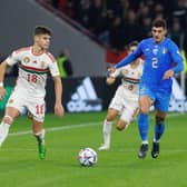 Milos Kerkez of Hungary competes for the ball with Giovanni Di Lorenzo of Italy (Photo by Laszlo Szirtesi/Getty Images)