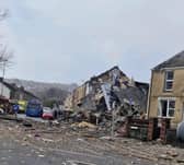 The person previously reported as missing after a suspected gas explosion in Swansea has been found dead.