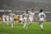 Leeds United players celebrate vs Wolves.