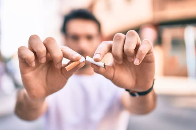 Smokers spend enough on cigarettes in their lifetime to afford four brand new family cars (SWNS)