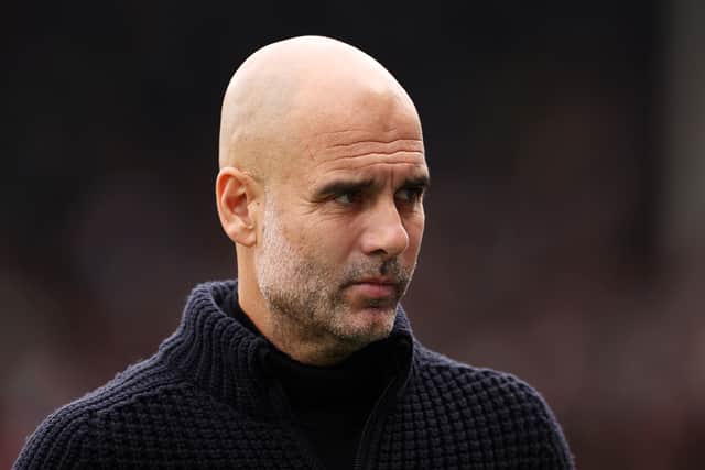 Manchester City manager Pep Guardiola looks on during a match