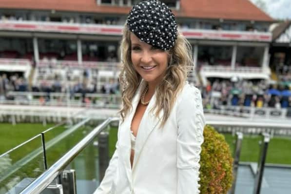 Helen beamed as she posed for a picture beside the racecourse on Thursday. (Picture: Instagram/@helenskelton)