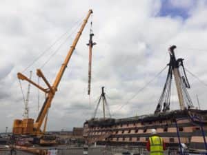 The lower main mast of HMS Victory being lifted from the ship (photo: NMRN)