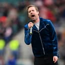Lead Singer of the Kaiser Chiefs, Ricky Wilson performs ahead of  the Gallagher Premiership Rugby match between Harlequins and Bath Rugby at Twickenham Stadium on April 22, 2023 in London, England. (Photo by Alex Davidson/Getty Images)