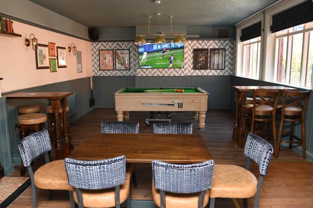 The new sports area featuring a pool table and darts boards. Picture: Gerard Binks