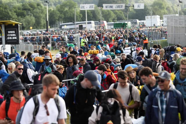 People head in to Glastonbury Festival after Emily Eavis officially opened the festival.