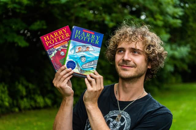 Max Roe with first edition copies of Harry Potter books his mum got him when he was young. Picture by Yorkshire Post / SWNS
