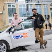 Chris Neary from Amber Cars and Dhruv Dev, Student Union President, outside Leeds Beckett University, Leeds, UK. Picture by Anthony Devlin
