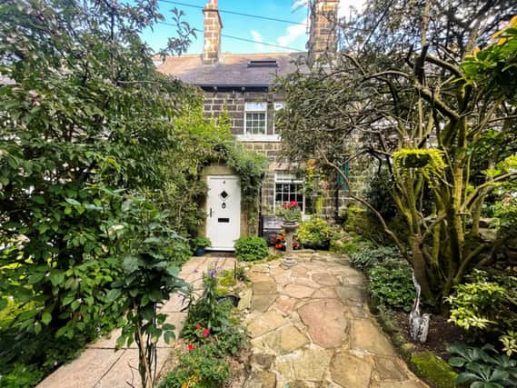 This stunning stone cottage is on the market.