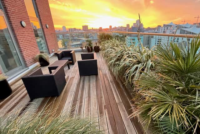 The property has a large outdoor terrace as well as three west-facing balconies. Picture by Carter Jonas