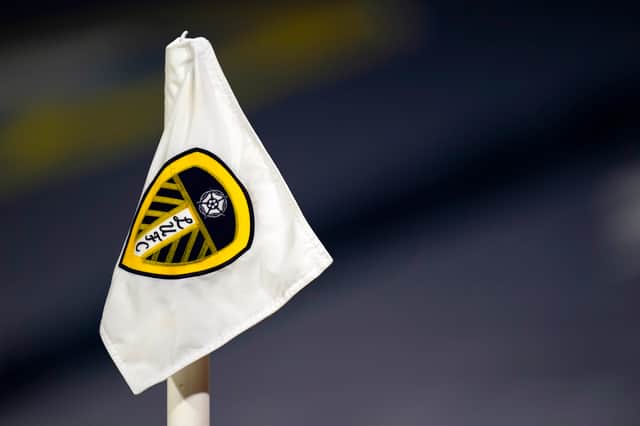 Leeds United logo on a flag.