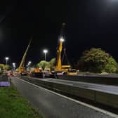 Captivating footage has been shared showing the grand entrance of one of two new super-span gantries being lifted into place above the M621 in Leeds. Picture by National Highways