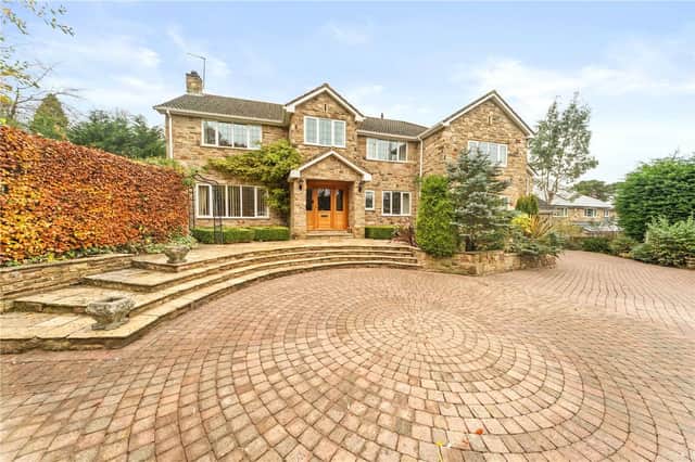 A stunning five bedroom country home is for sale.