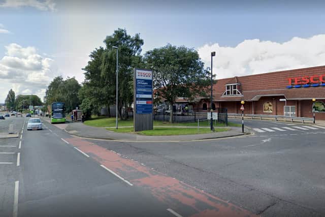 Road closures were put in place after a car crashed into a post outside Tesco on Roundhay Road on Friday night. Picture by Google