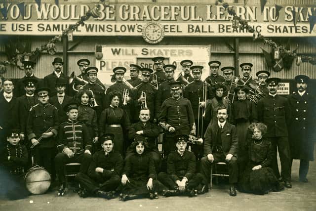 Postcard showing a group of people, including a military band and roller skaters, at the American Roller Skating Rink in Headingley. Circa 1908 to 1910.