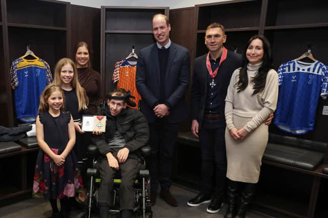 The Prince of Wales met with Rob Burrow, Kevin Sinfield and their families to present the two men with CBEs for their 'incredible' charity work.