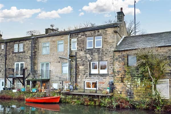 This gorgeous home with a canal-side garden on Town Street in Rodley is on the market for £270,000.