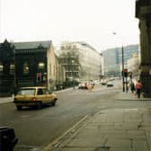 Looking north up Calverley Street showing the junction with Alexander Street on the right. Just beyond this, the edge of the Education Offices can be seen. In the background are the Brotherton Wing of Leeds General Infirmary and buildings of Leeds Polytechnic.