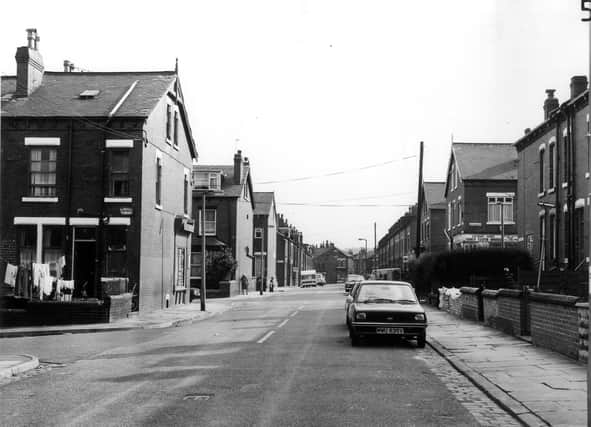 Looking south along Bude Road towards Trentham Street in the distance. On the left is the junction with Clovelly Terrace, then moving back, Stratford Street, Back Stratford Terrace and Stratford Terrace lead off to both left and right. A corner shop. Satwant Virdee's Fancy Cloth House, is seen to the right. Pictured in August 1983.