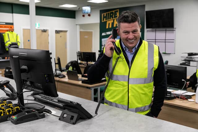 Ian took the opportunity to handle a few customer calls during his visit. Picture by Lee McLean/SWNS