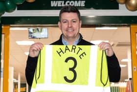 Former Leeds United footballer Ian Harte paid a visit to the new Travis Perkins branch just a short walk from Elland Road. Picture by Lee McLean/SWNS