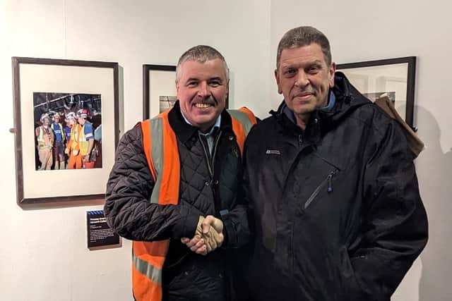 Martyn Pitt exploring the exhibition with Pete Wordsworth, Deputy Mine Manager, reminiscing about the final decades of mining. Photo by NCMME