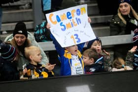 A young fan shows his support.