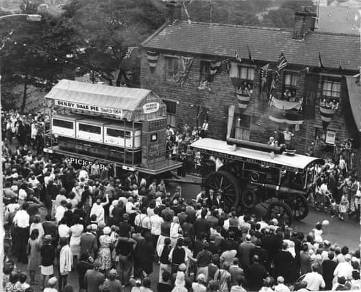 September 1964 and the great pie of Denby Dale made its public appearance after 48 hours simmering in farmer Hector Buckley's barn. It is being towed by steam traction engine.