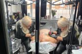 Kate Challinor performing a mastectomy tattoo (Photo by Kate Challinor/SWNS)
