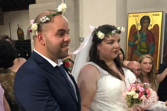 Sophie and Alekos McGarry on their wedding day. Photo: Sophie Watkins/SWNS.