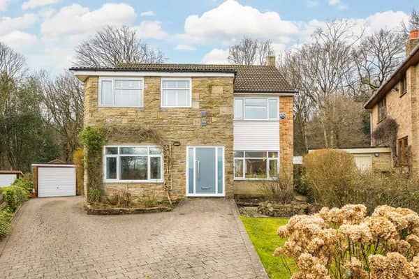 An extended family home on a large corner plot in Horsforth is up for sale.