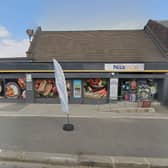 Two tills were ripped out with crowbars during an armed robbery at the Nisa Local store on Bradford Road, Tingley, on February 23. Photo: Google.